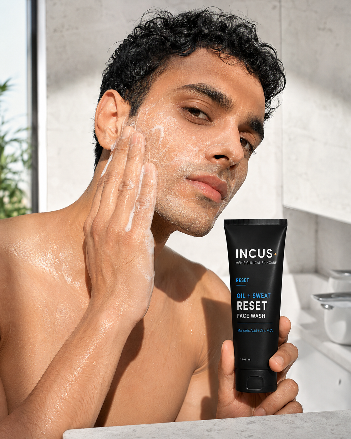 Massaging the face wash onto damp skin in the morning